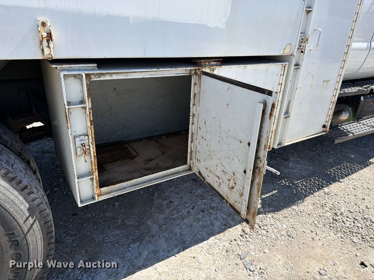 image for item YA3708 2015 Ford  F750 Super Duty Ext. Cab chipper truck