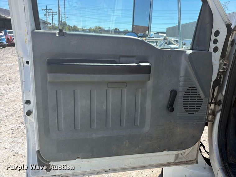 image for item YA3708 2015 Ford  F750 Super Duty Ext. Cab chipper truck