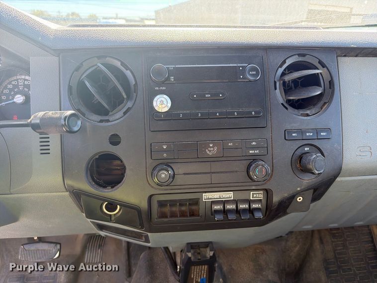 image for item YA3708 2015 Ford  F750 Super Duty Ext. Cab chipper truck