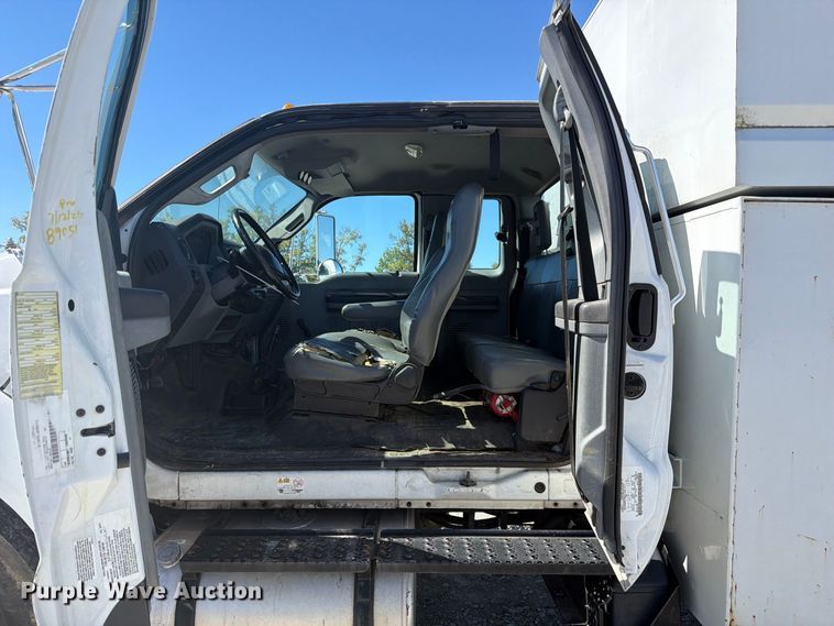 image for item YA3708 2015 Ford  F750 Super Duty Ext. Cab chipper truck