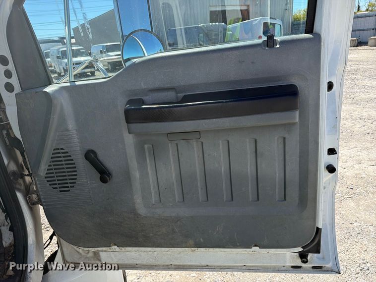 image for item YA3708 2015 Ford  F750 Super Duty Ext. Cab chipper truck