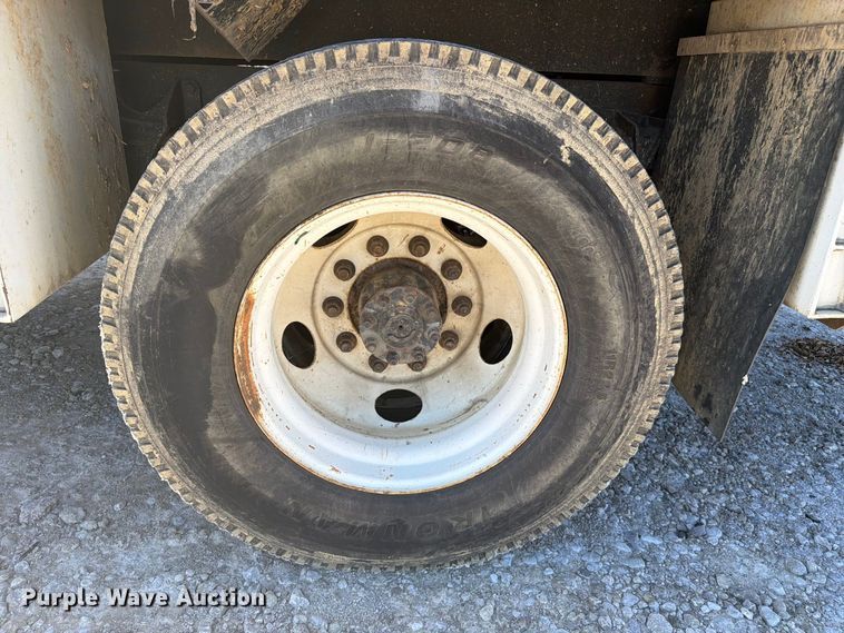 image for item YA3708 2015 Ford  F750 Super Duty Ext. Cab chipper truck