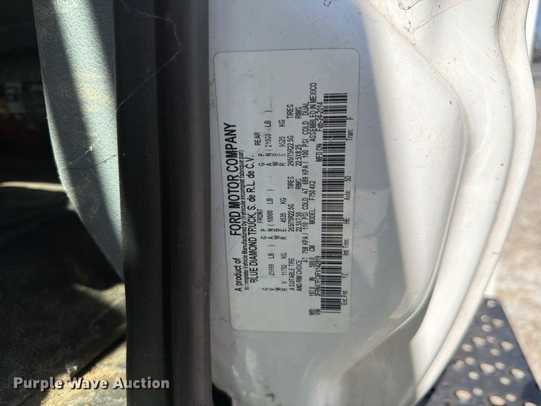image for item YA3708 2015 Ford  F750 Super Duty Ext. Cab chipper truck