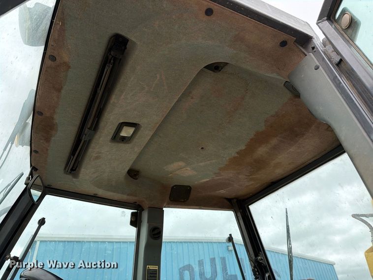image for item DW6786 2000 New Holland LB75 Backhoe