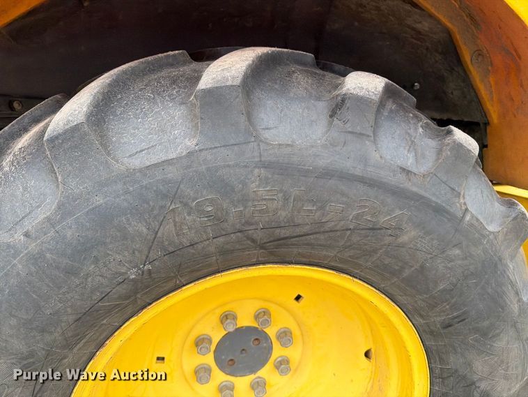 image for item DW6786 2000 New Holland LB75 Backhoe
