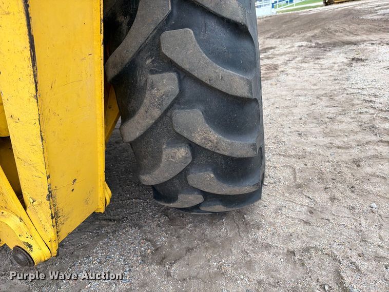 image for item DW6786 2000 New Holland LB75 Backhoe