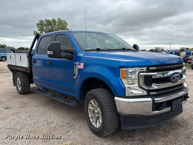 image for item FK3731 2020 Ford F250 STX Crew Cab dump flatbed pickup truck