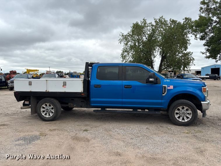 image for item FK3731 2020 Ford F250 STX Crew Cab dump flatbed pickup truck