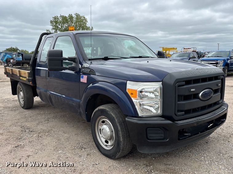 image for item FK3734 2012 Ford F250 XL Ext cab flatbed pickup truck
