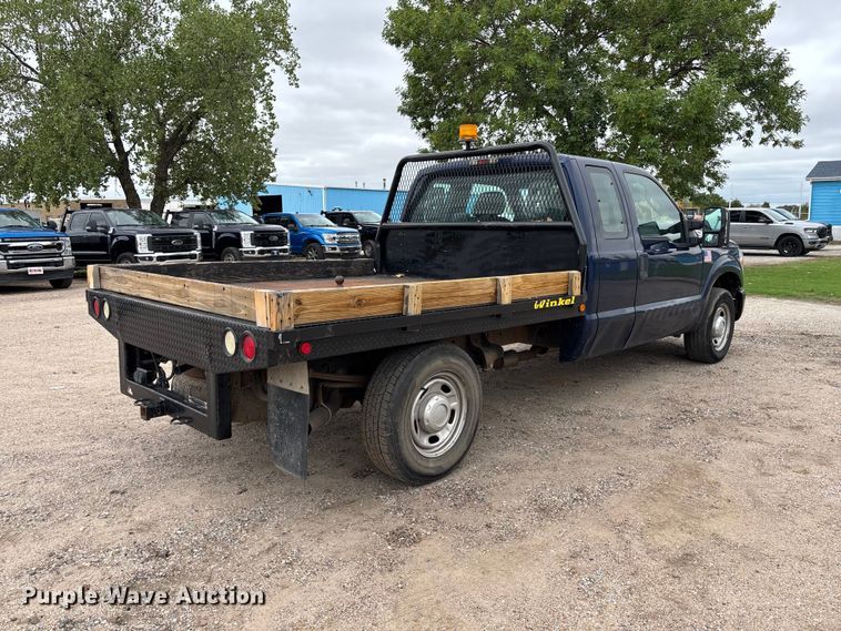 image for item FK3734 2012 Ford F250 XL Ext cab flatbed pickup truck