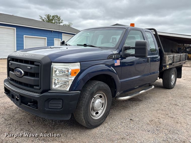 image for item FK3735 2012 Ford F250 XL Ext cab flatbed pickup truck