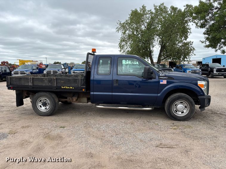 image for item FK3735 2012 Ford F250 XL Ext cab flatbed pickup truck