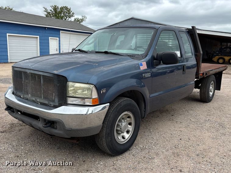 image for item FK3736 2004 Ford F250 XLT Ext cab flatbed pickup truck