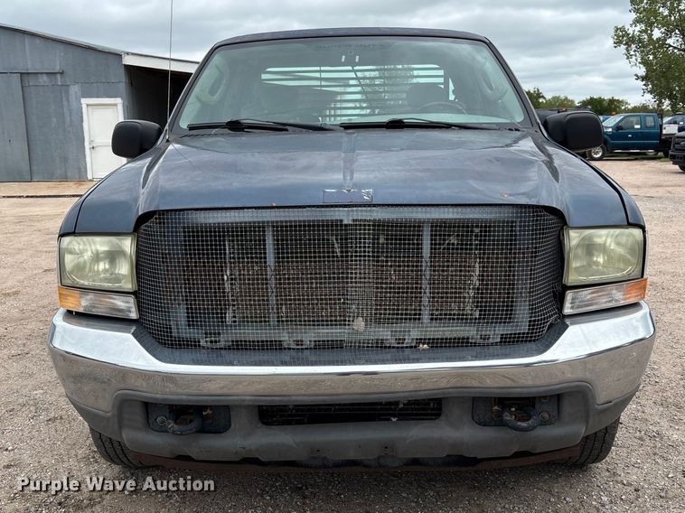 image for item FK3736 2004 Ford F250 XLT Ext cab flatbed pickup truck
