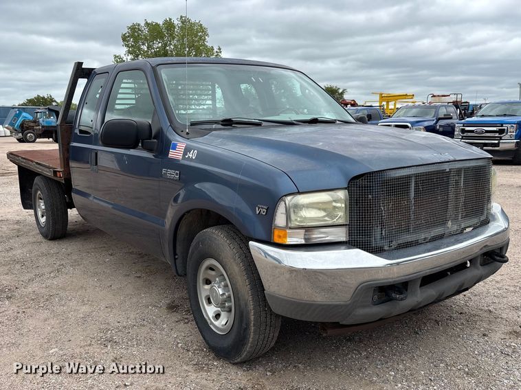 image for item FK3736 2004 Ford F250 XLT Ext cab flatbed pickup truck