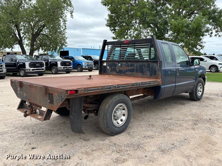 image for item FK3736 2004 Ford F250 XLT Ext cab flatbed pickup truck