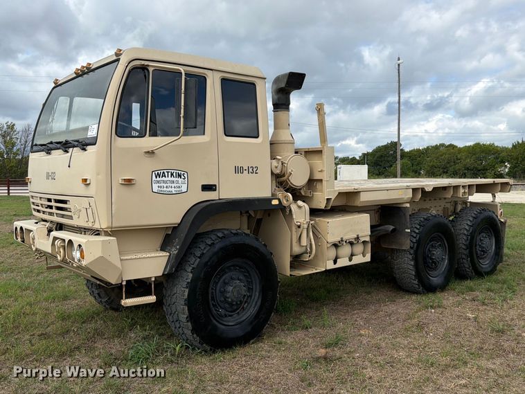image for item FN3596 1997 Stewart and Stevenson M1083 6X6 flatbed truck