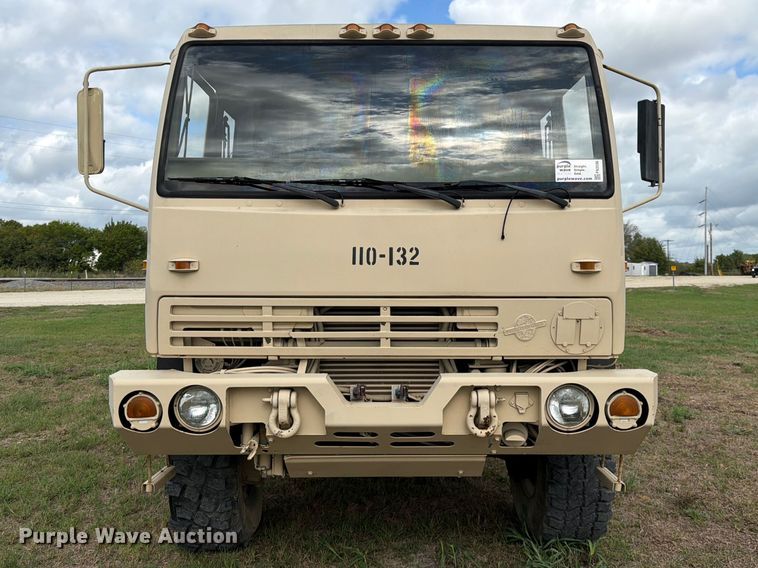 image for item FN3596 1997 Stewart and Stevenson M1083 6X6 flatbed truck