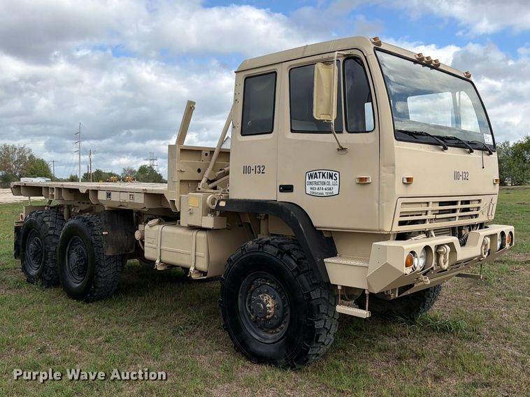 image for item FN3596 1997 Stewart and Stevenson M1083 6X6 flatbed truck