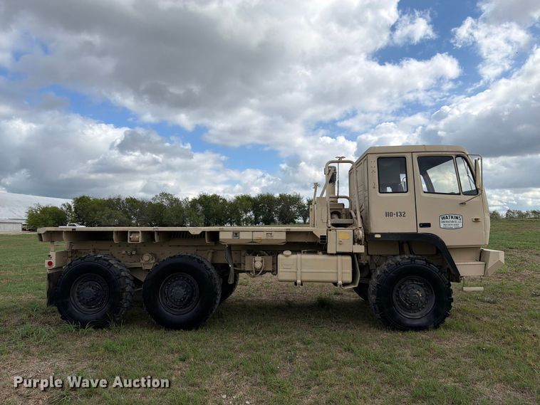 image for item FN3596 1997 Stewart and Stevenson M1083 6X6 flatbed truck