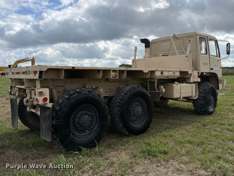image for item FN3596 1997 Stewart and Stevenson M1083 6X6 flatbed truck