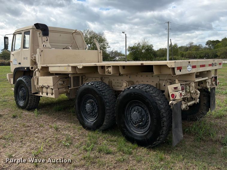 image for item FN3596 1997 Stewart and Stevenson M1083 6X6 flatbed truck