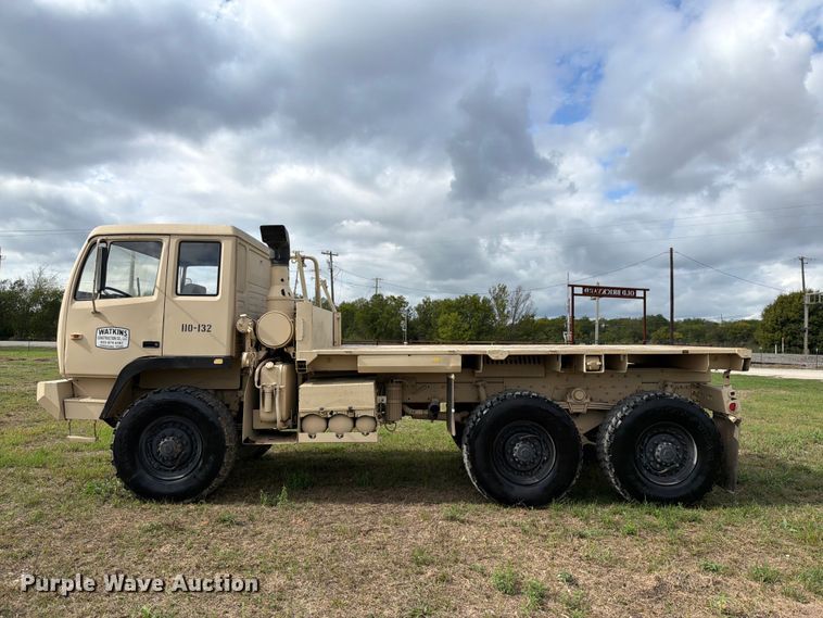 image for item FN3596 1997 Stewart and Stevenson M1083 6X6 flatbed truck