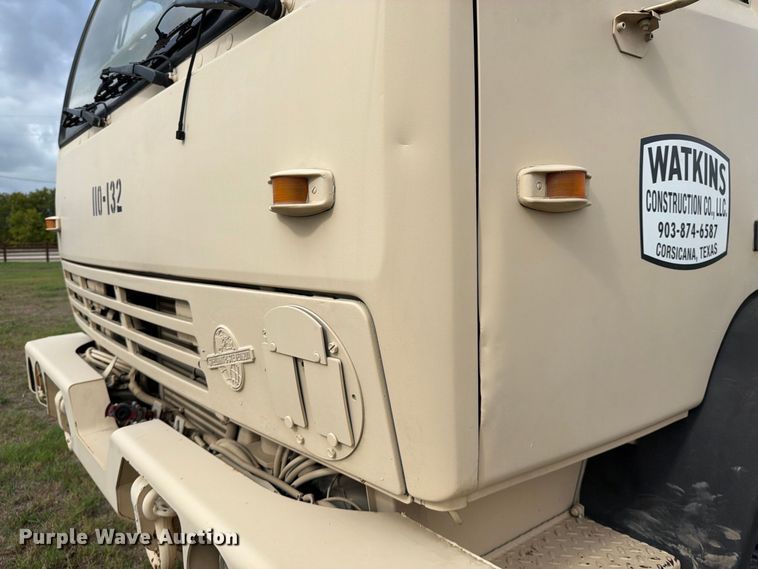 image for item FN3596 1997 Stewart and Stevenson M1083 6X6 flatbed truck