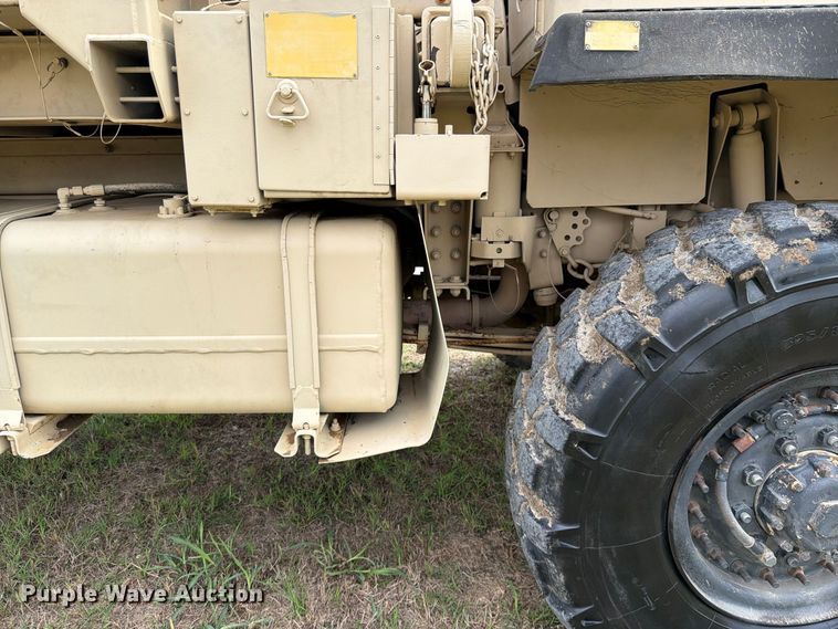 image for item FN3596 1997 Stewart and Stevenson M1083 6X6 flatbed truck