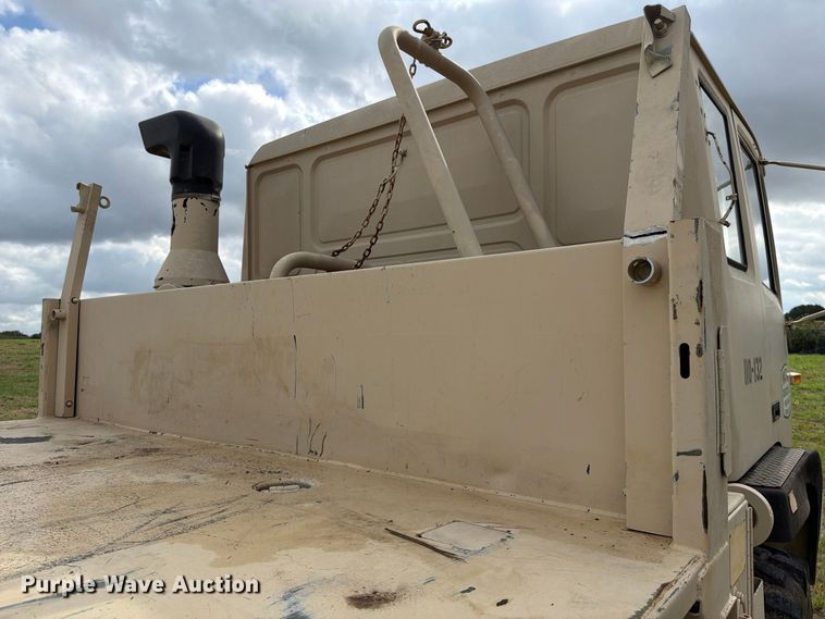 image for item FN3596 1997 Stewart and Stevenson M1083 6X6 flatbed truck