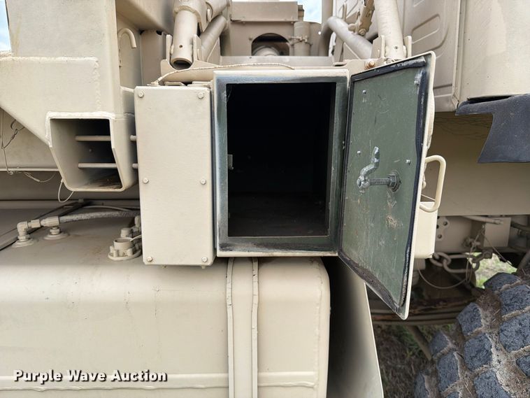 image for item FN3596 1997 Stewart and Stevenson M1083 6X6 flatbed truck
