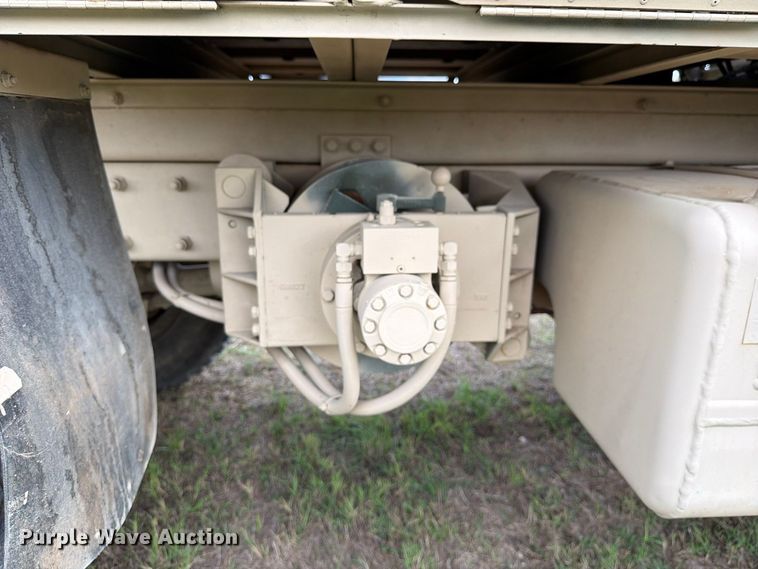 image for item FN3596 1997 Stewart and Stevenson M1083 6X6 flatbed truck