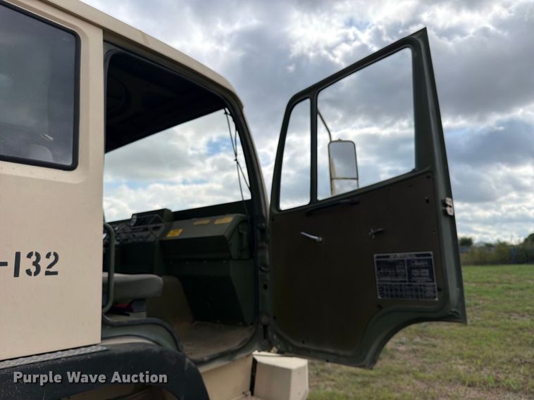 image for item FN3596 1997 Stewart and Stevenson M1083 6X6 flatbed truck