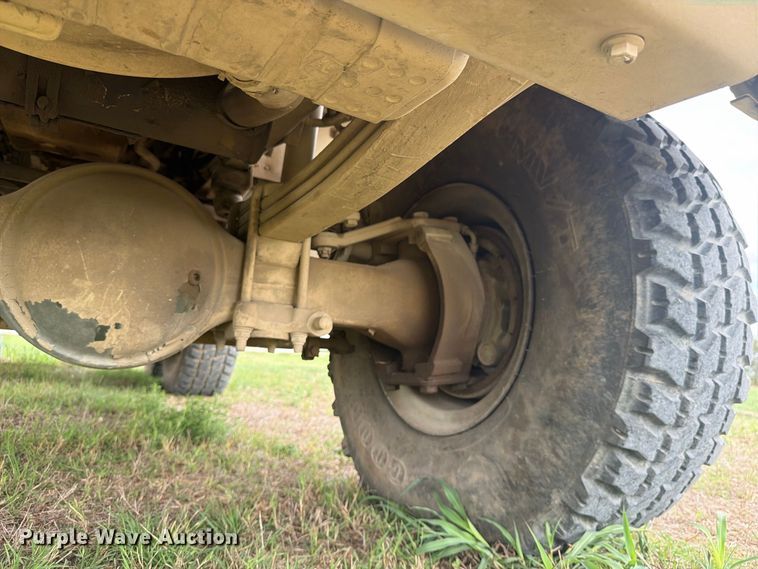 image for item FN3596 1997 Stewart and Stevenson M1083 6X6 flatbed truck