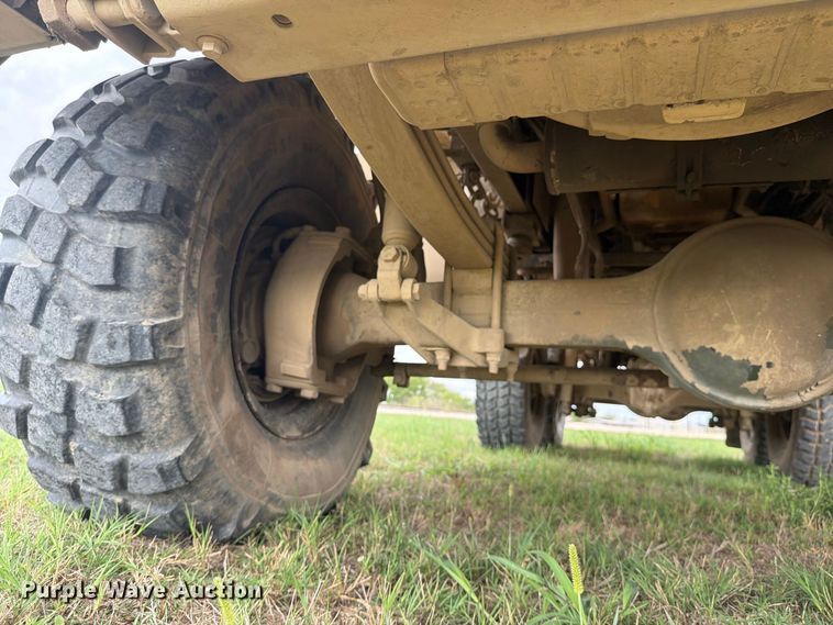 image for item FN3596 1997 Stewart and Stevenson M1083 6X6 flatbed truck