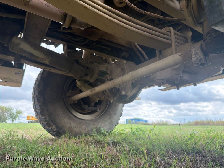 image for item FN3596 1997 Stewart and Stevenson M1083 6X6 flatbed truck