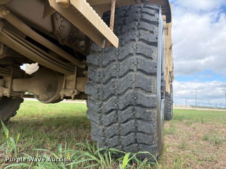 image for item FN3596 1997 Stewart and Stevenson M1083 6X6 flatbed truck