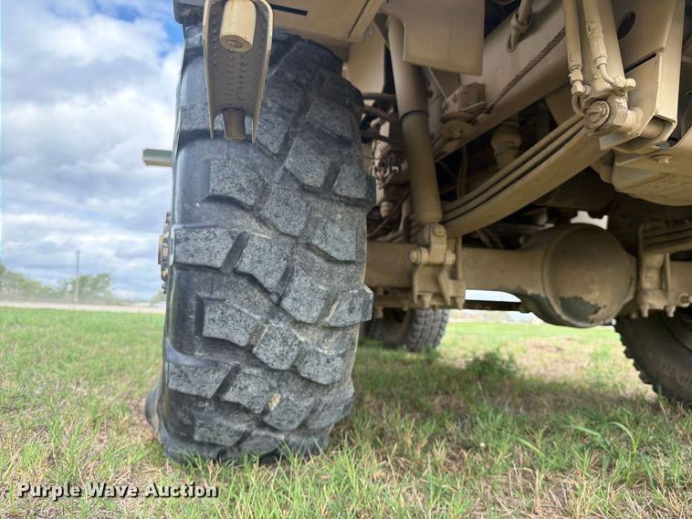 image for item FN3596 1997 Stewart and Stevenson M1083 6X6 flatbed truck
