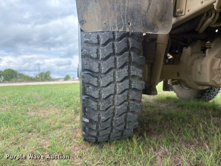 image for item FN3596 1997 Stewart and Stevenson M1083 6X6 flatbed truck