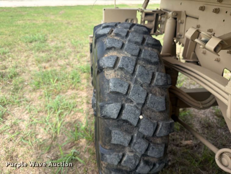 image for item FN3596 1997 Stewart and Stevenson M1083 6X6 flatbed truck