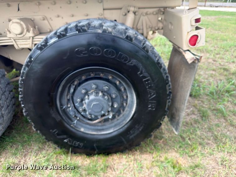 image for item FN3596 1997 Stewart and Stevenson M1083 6X6 flatbed truck