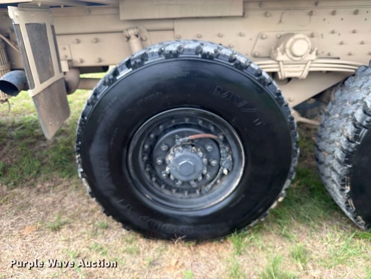 image for item FN3596 1997 Stewart and Stevenson M1083 6X6 flatbed truck