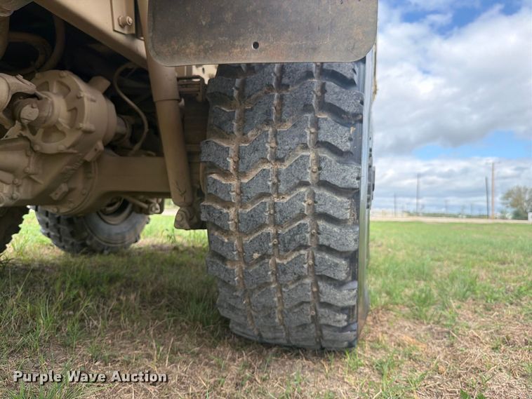 image for item FN3596 1997 Stewart and Stevenson M1083 6X6 flatbed truck