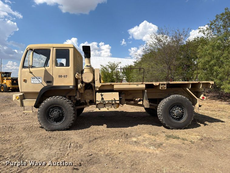 image for item FN3654 1996 Stewart & Stevenson flatbed truck