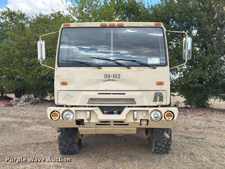 image for item FN3655 2004 Stewart & Stevenson 4X4 flatbed truck