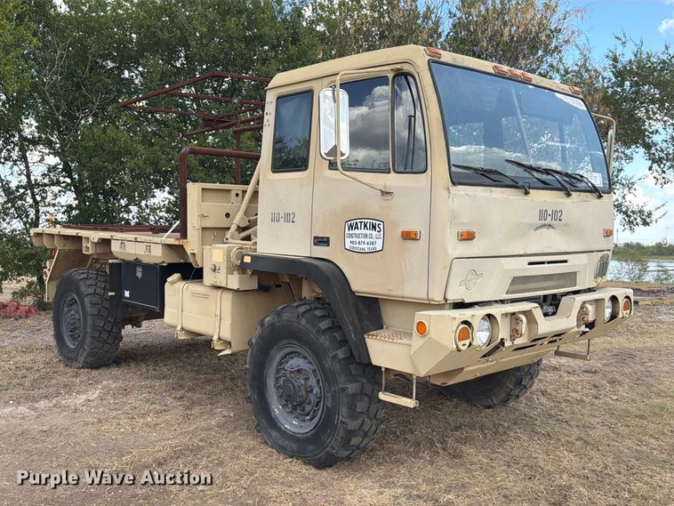 image for item FN3655 2004 Stewart & Stevenson 4X4 flatbed truck