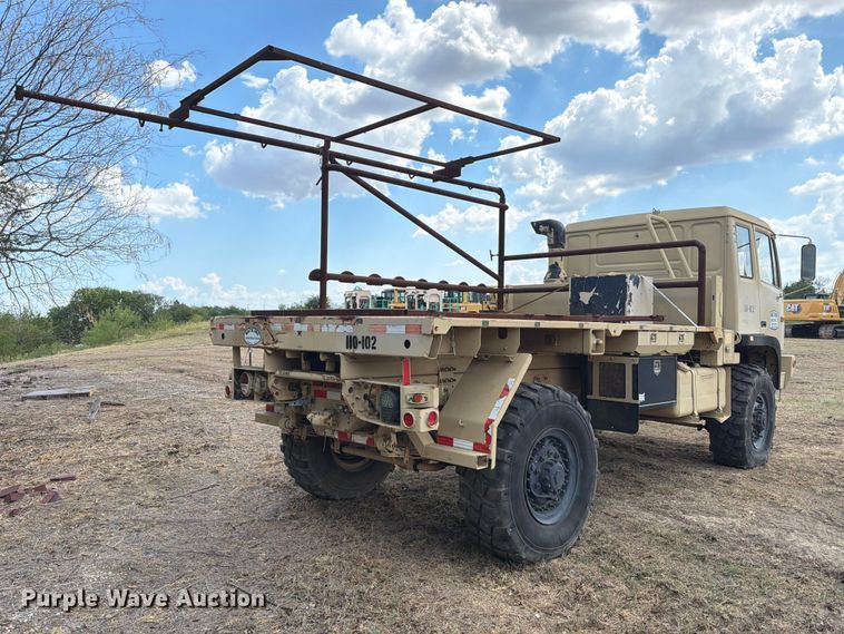 image for item FN3655 2004 Stewart & Stevenson 4X4 flatbed truck