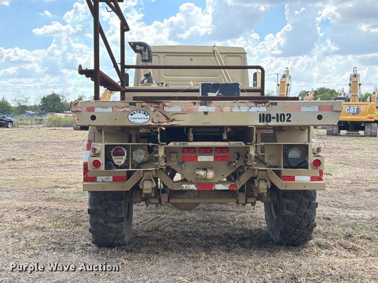 image for item FN3655 2004 Stewart & Stevenson 4X4 flatbed truck