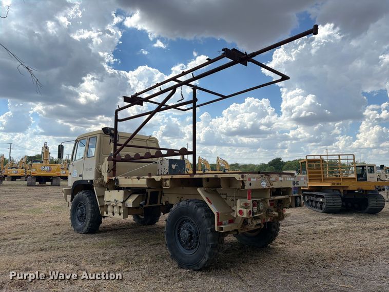 image for item FN3655 2004 Stewart & Stevenson 4X4 flatbed truck