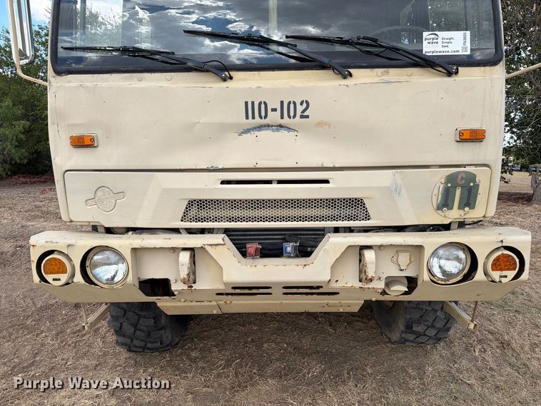 image for item FN3655 2004 Stewart & Stevenson 4X4 flatbed truck